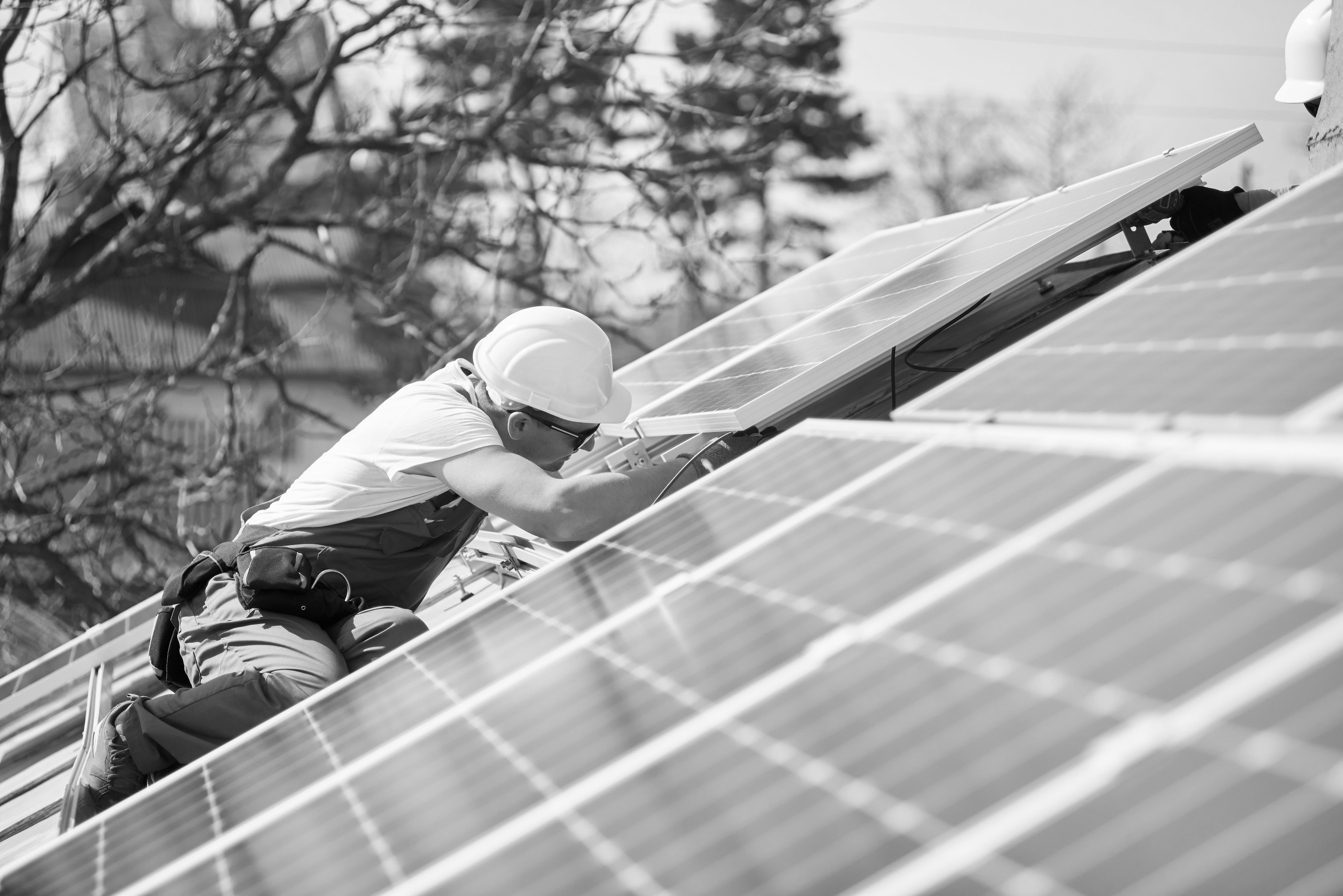 installing-solar 2-photovoltaic-panel-system-on-roof-2022-05-16-16-02-12-utc